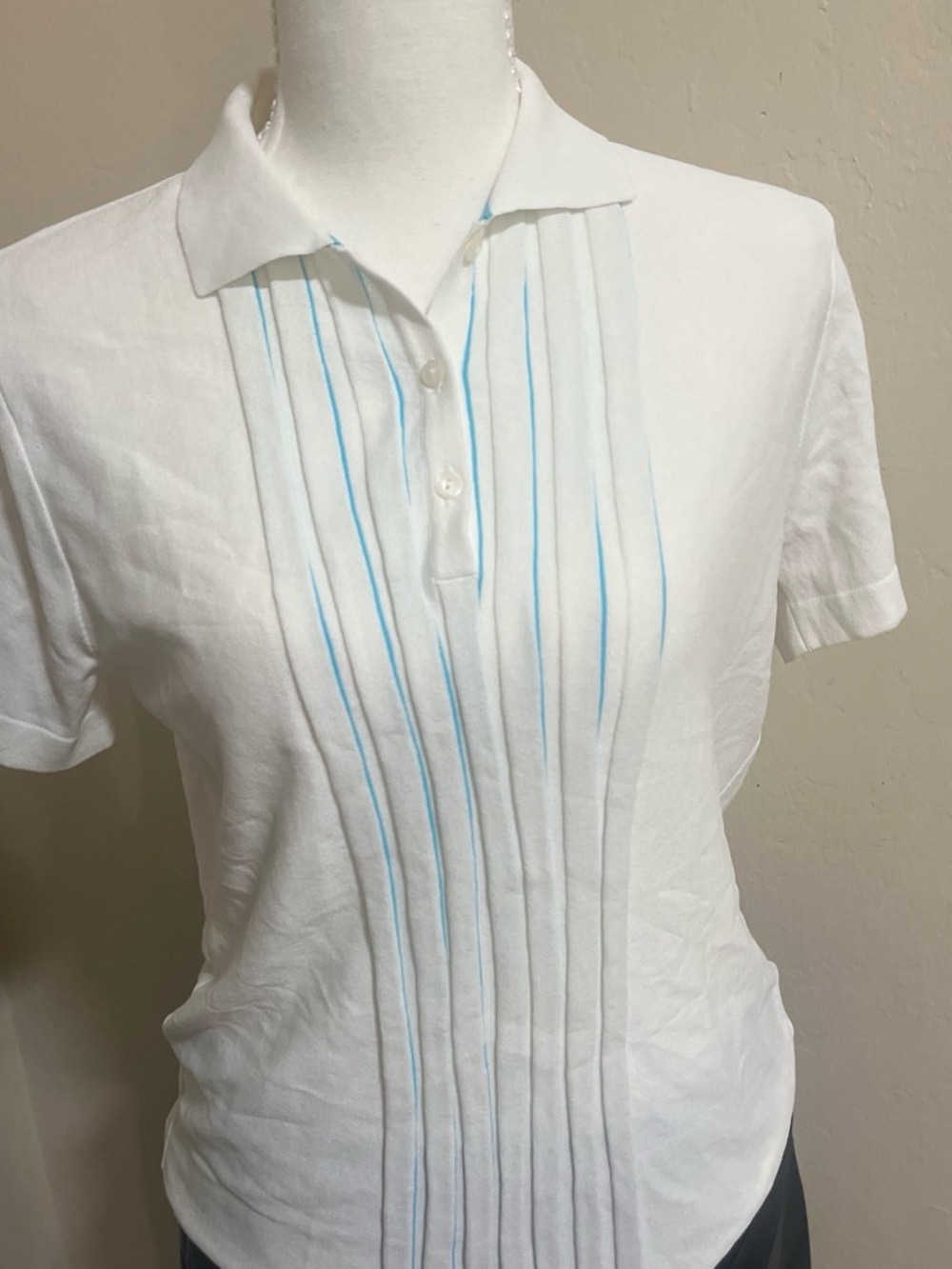 Women’s White Pintuck Polo Top with Light Blue Accents